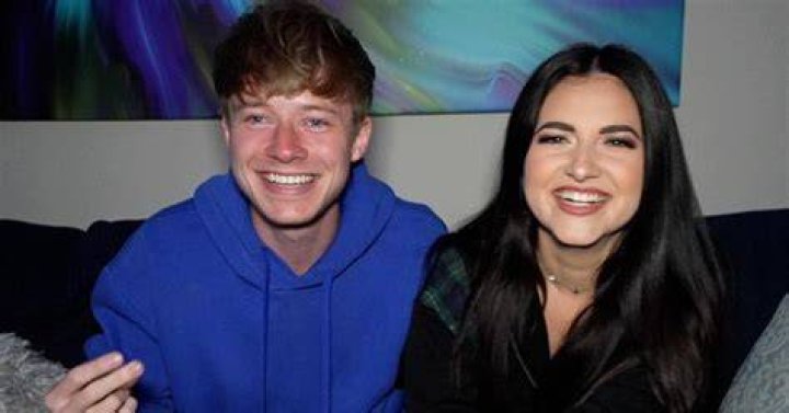 Sam Golbach and Katrina Stuart looking at each other.
